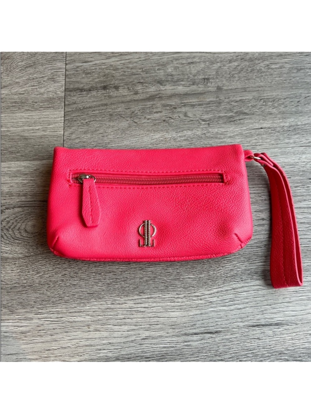 JLO Bright Coral Faux Leather Wristlet Clutch.